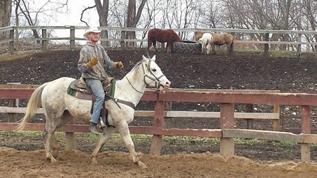 Man riding a horse